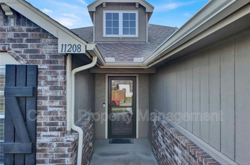 11208 N 146th East Ave - Photo 2 of 19