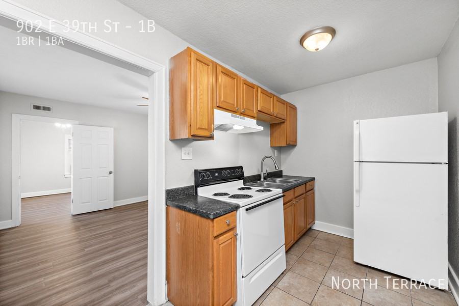 902 E 39th - Photo 2 of 12