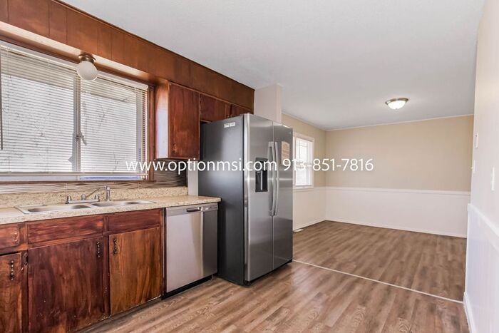 8006 E 118th Ter - Photo 6 of 30