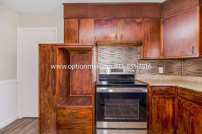 8006 E 118th Ter - Photo 7 of 30