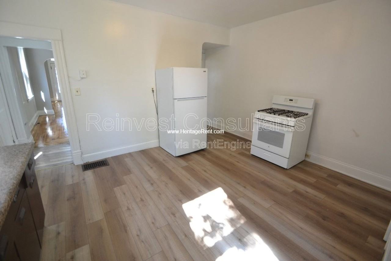 1658 Iliff Ave - Photo 4 of 11