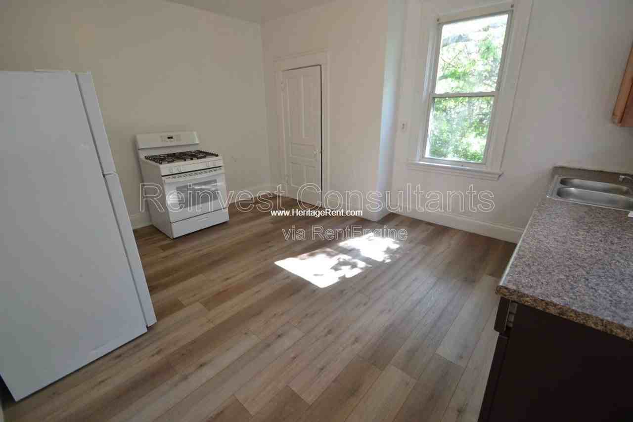 1658 Iliff Ave - Photo 5 of 11