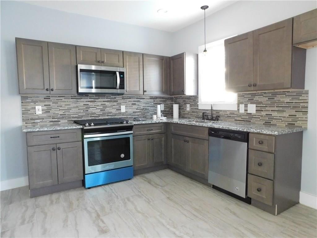 210 E 6th St - Photo 6 of 13