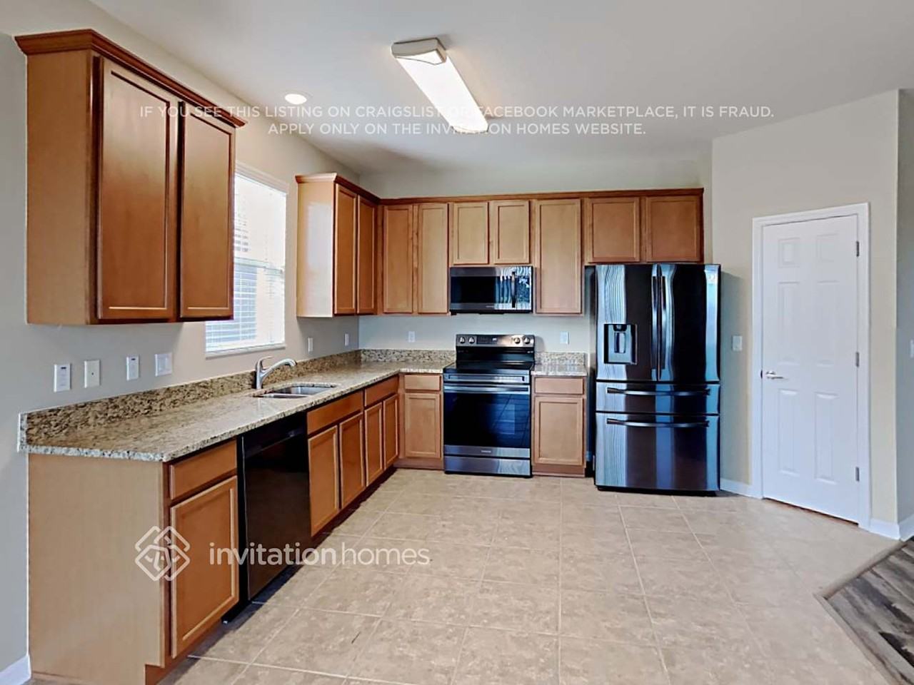 11237 82nd St E - Photo 5 of 17