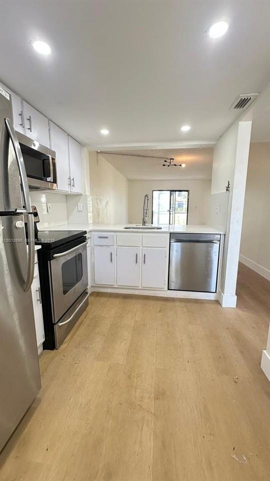 901 Ne 209th Ter #104-26 - Photo 5 of 22