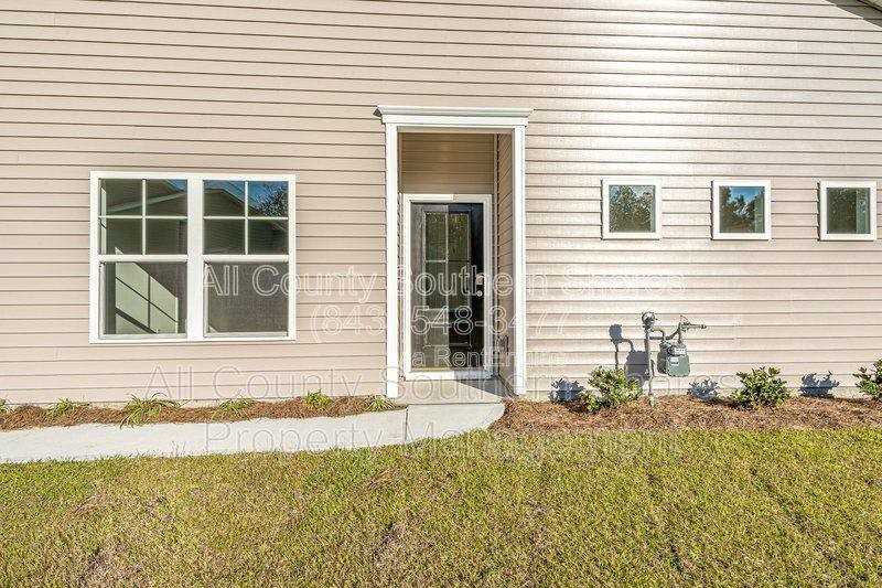 7023 Rivers Bridge Ct - Photo 3 of 10