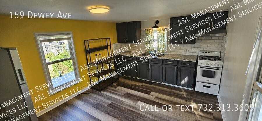 159 Dewey Ave - Photo 4 of 22