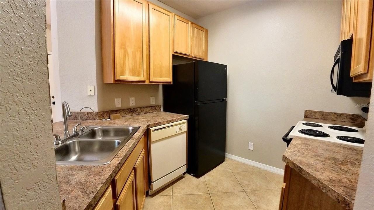 10017 Courtney Palms Blvd #304 - Photo 3 of 10