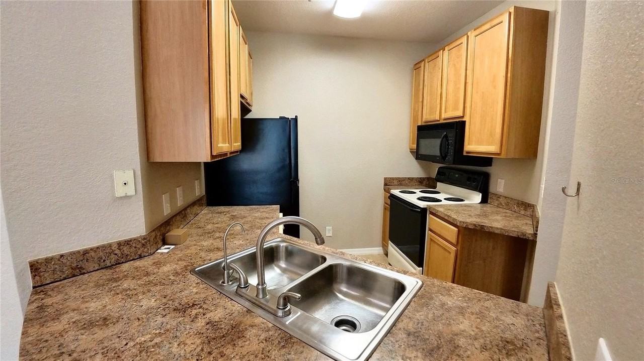 10017 Courtney Palms Blvd #304 - Photo 4 of 10