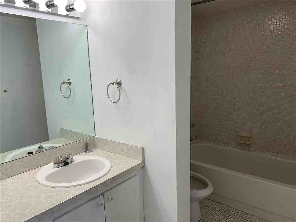 8390 Sands Point Blvd #210F - Photo 5 of 9