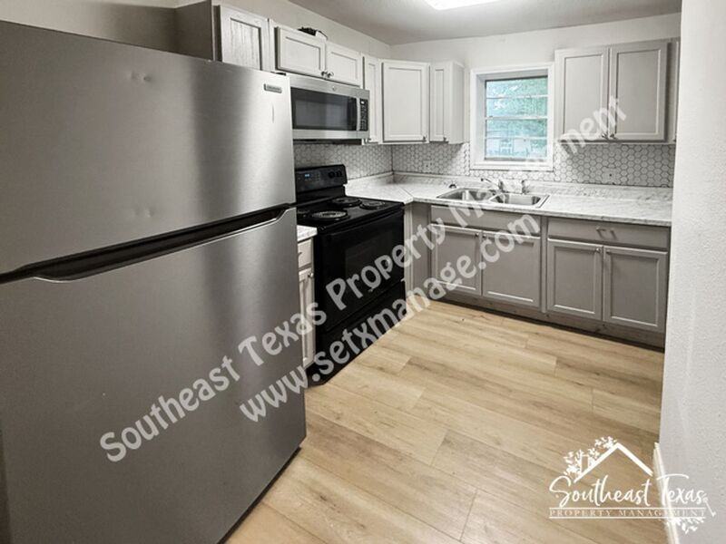 908 Stilwell Blvd - Photo 4 of 14