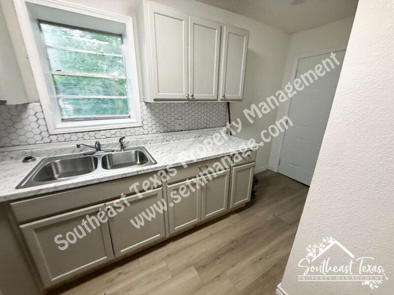 908 Stilwell Blvd - Photo 5 of 14