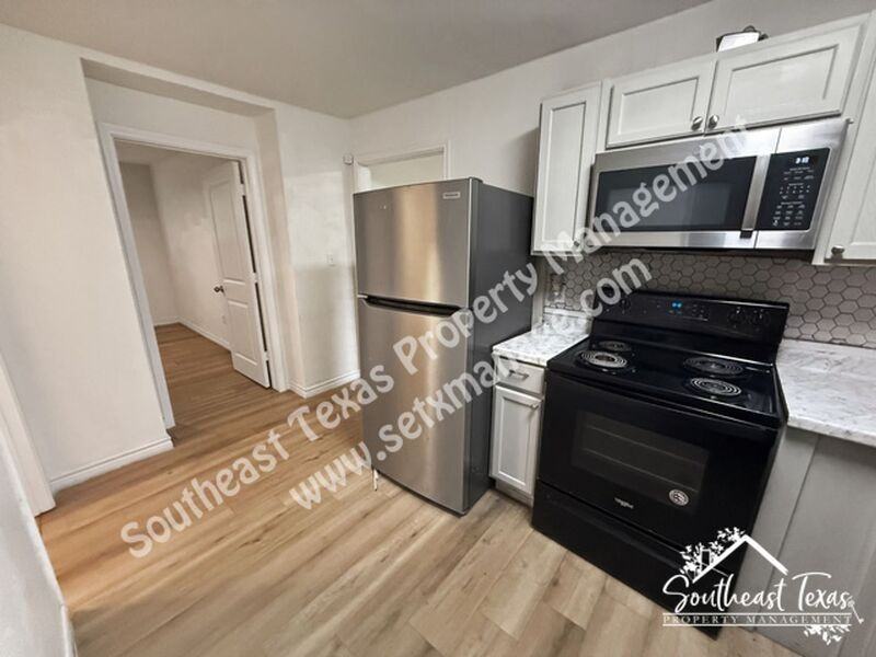 908 Stilwell Blvd - Photo 6 of 14