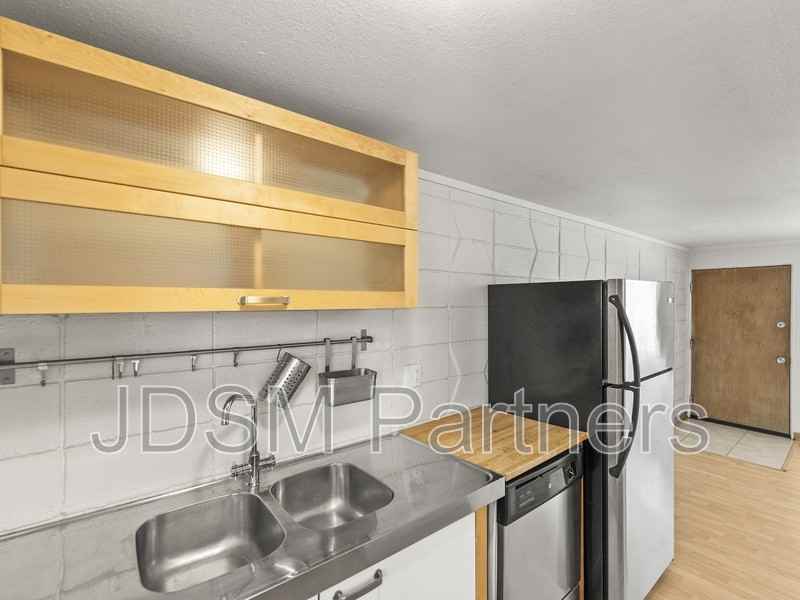 2860 W 32nd Ave #202 - Photo 4 of 10
