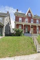 featured image of 216 W Broadway