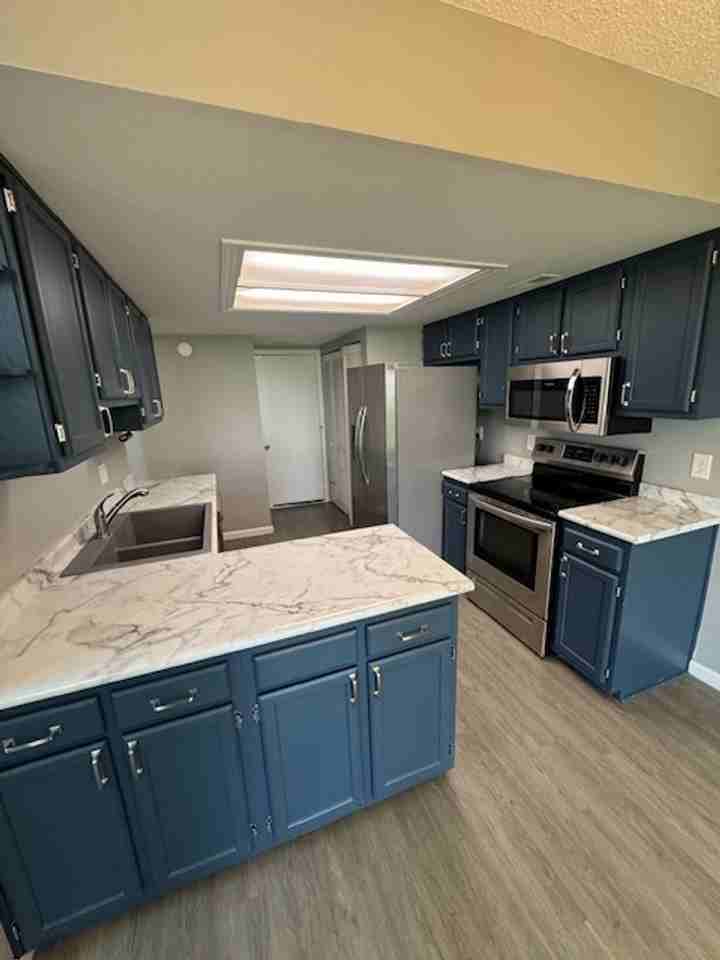 7045 Thamesford Dr - Photo 3 of 9