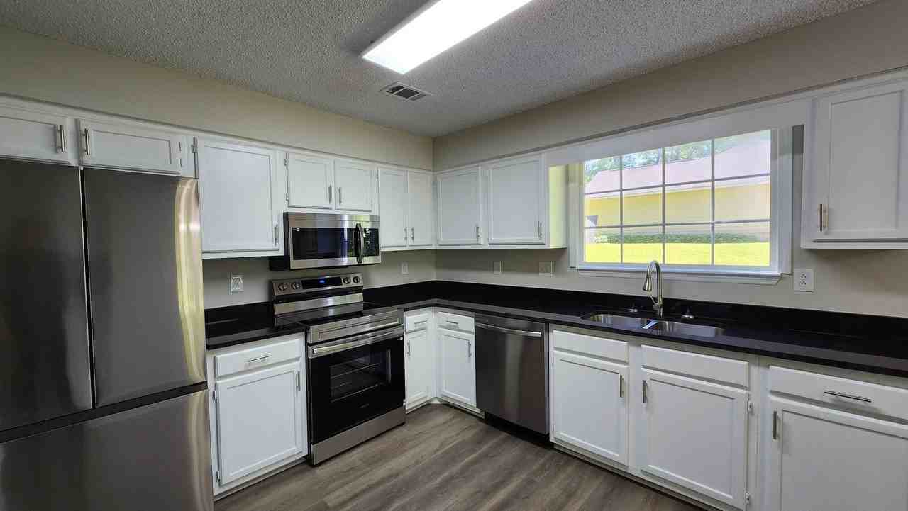 7847 Sugarland Dr - Photo 3 of 16