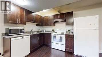 featured image of PRINGLE 700-061 - Pringle - 8632 84 Street #LOWER