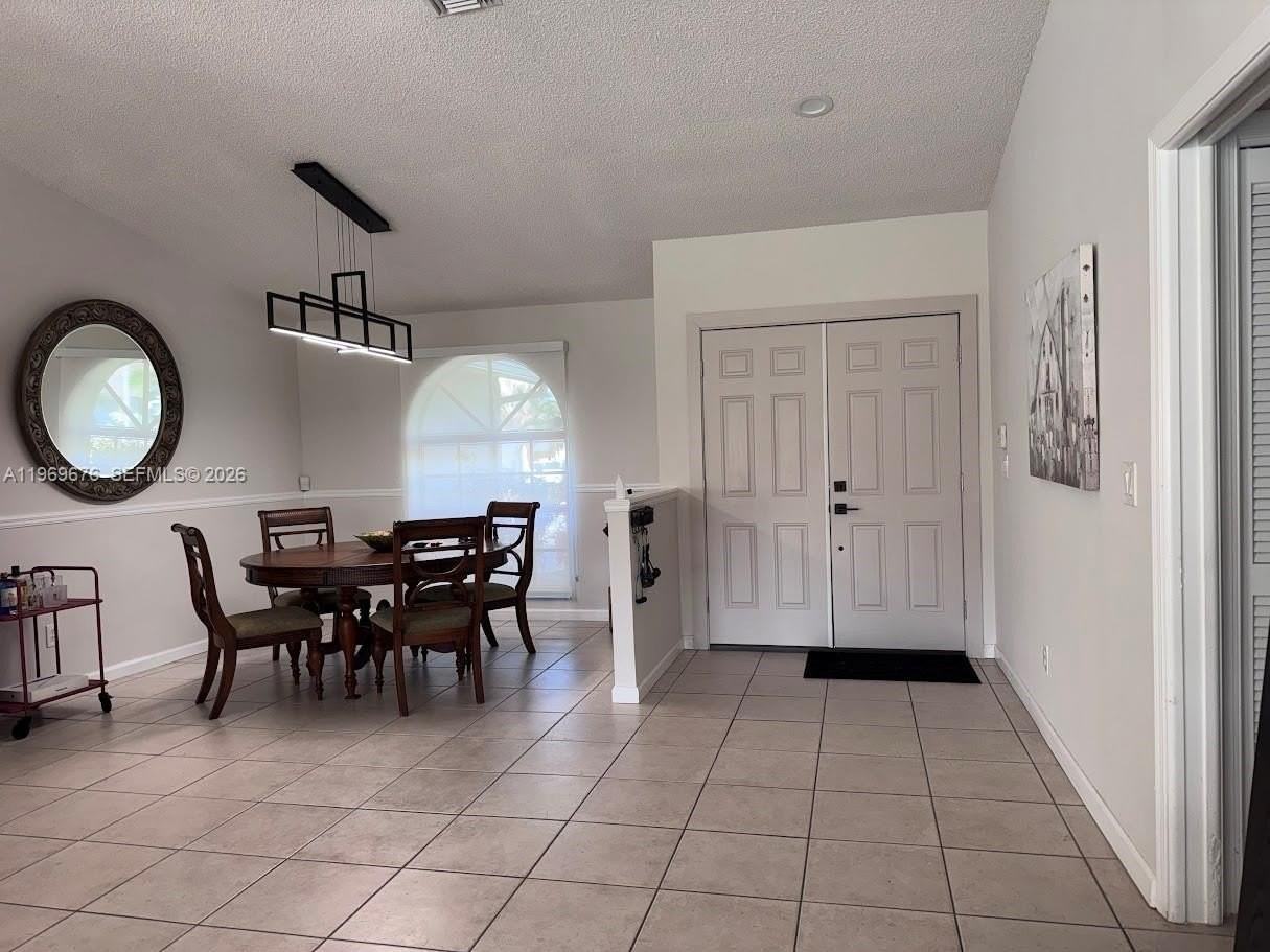 1080 Nw 100th Way - Photo 3 of 24