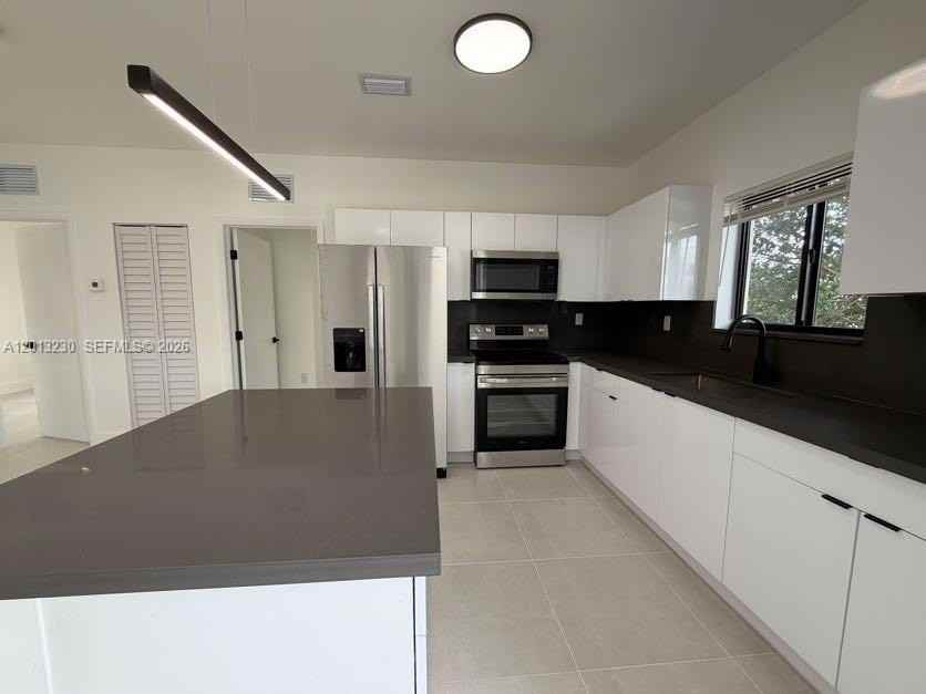 1440 Nw 61st St #1 - Photo 7 of 18