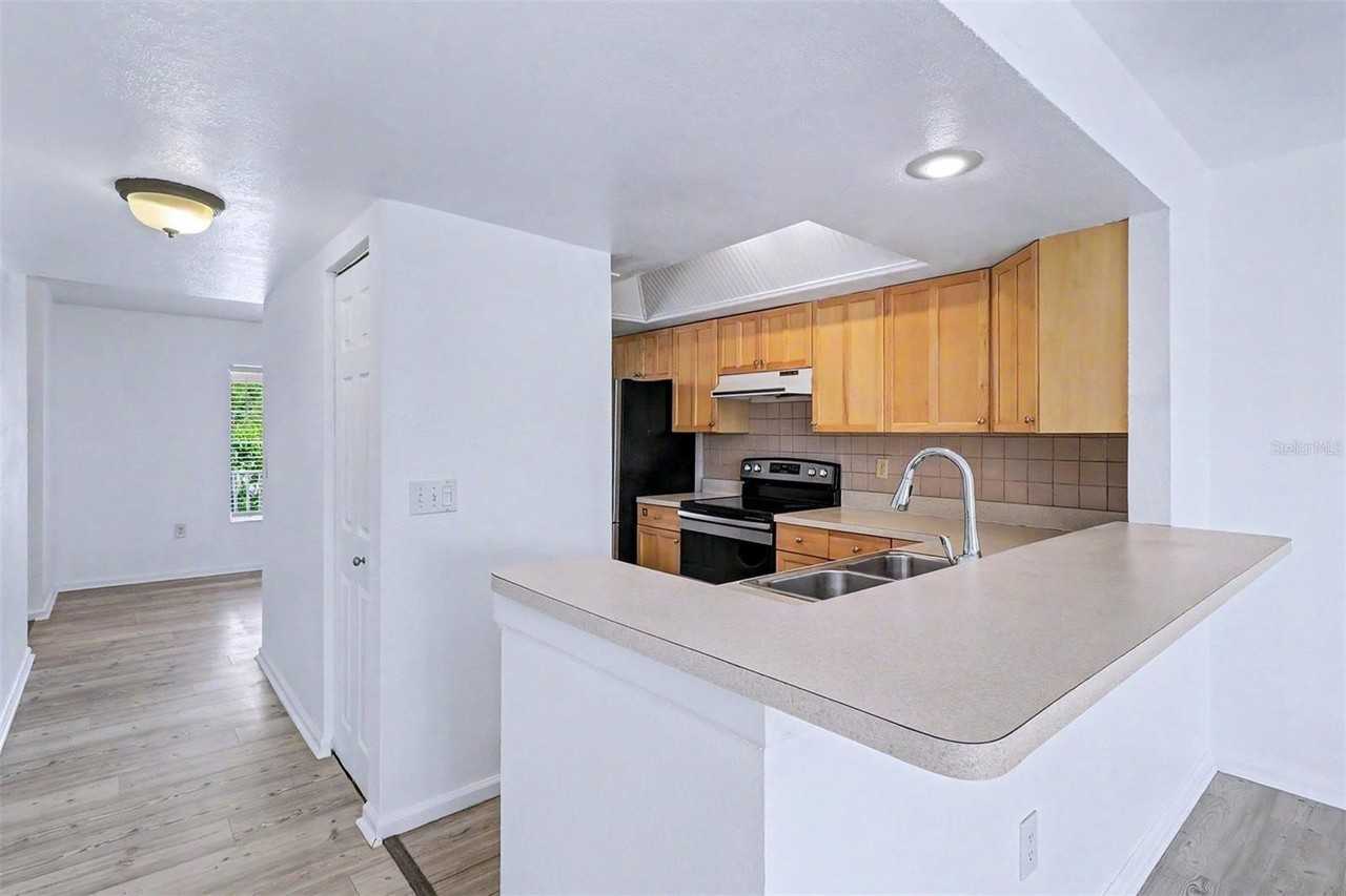 592 100th Ave N #202 - Photo 6 of 23