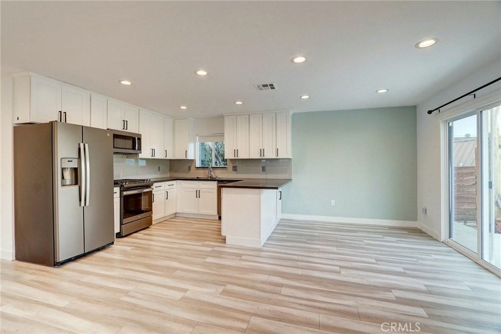 7441 Beckford Ave #1-2 - Photo 3 of 28