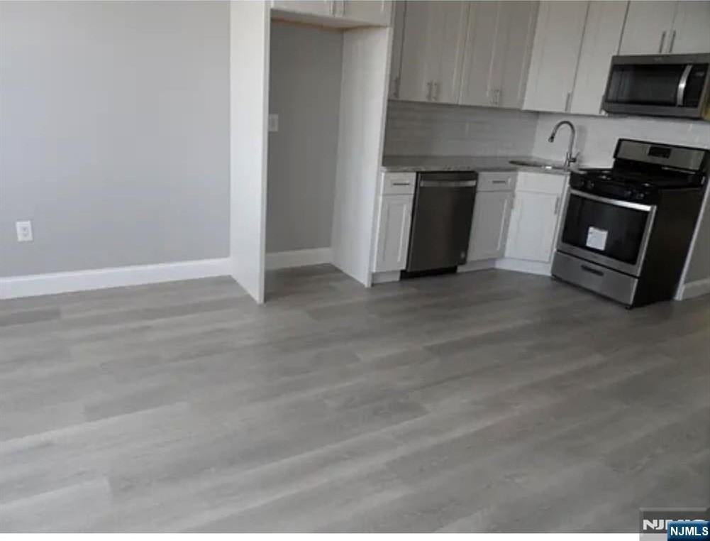 209 Avenue F ##2 - Photo 2 of 6
