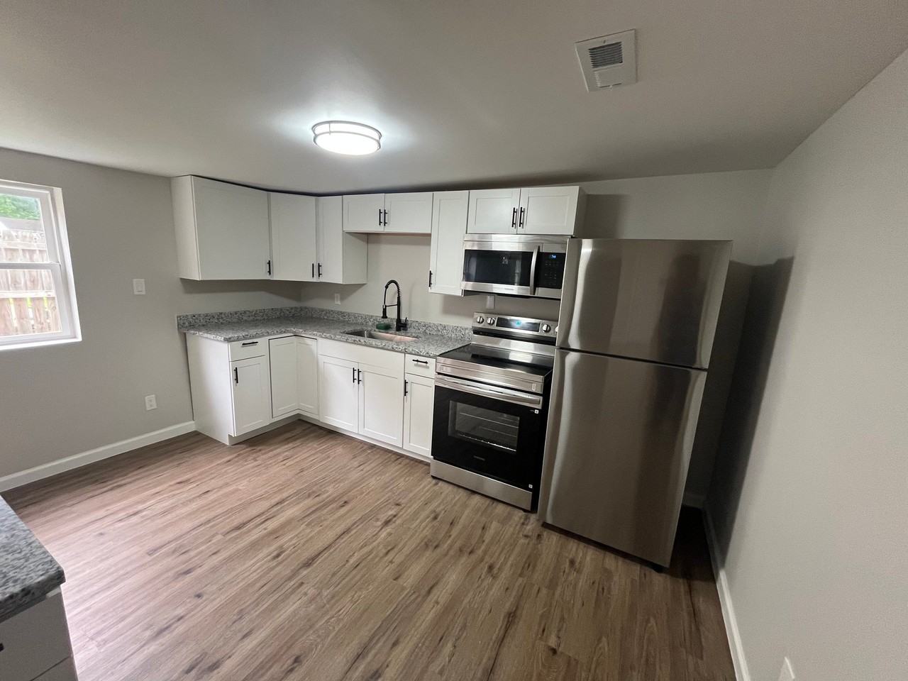 7011 Britton Ave #1 - Photo 3 of 19