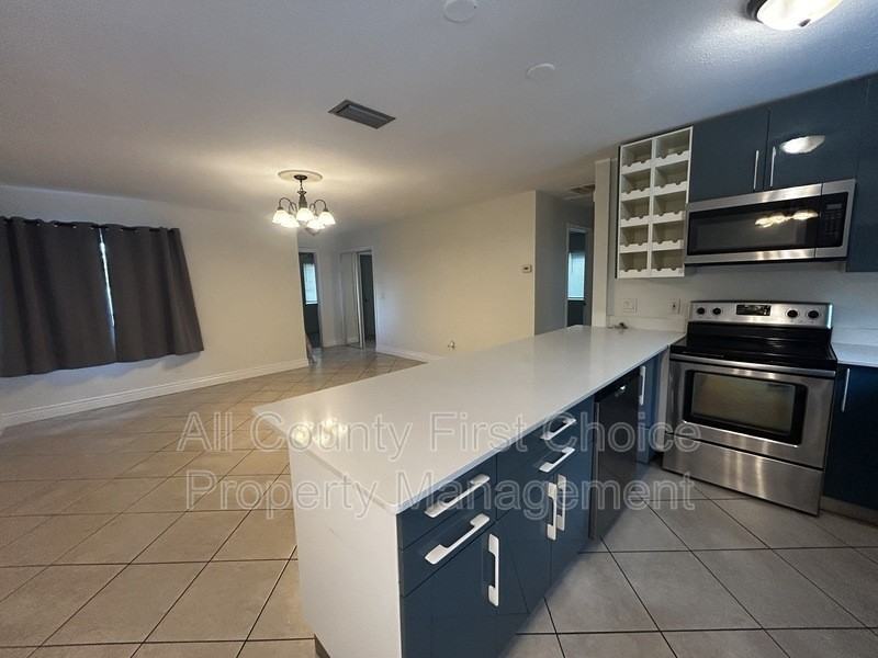 9369 93rd Ave - Photo 3 of 23
