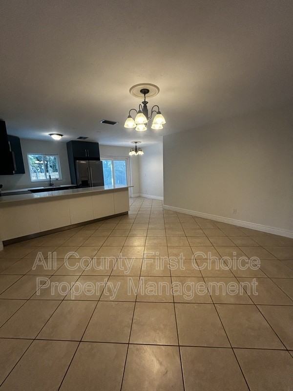 9369 93rd Ave - Photo 5 of 23