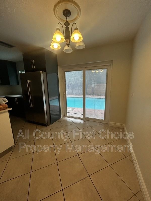 9369 93rd Ave - Photo 7 of 23