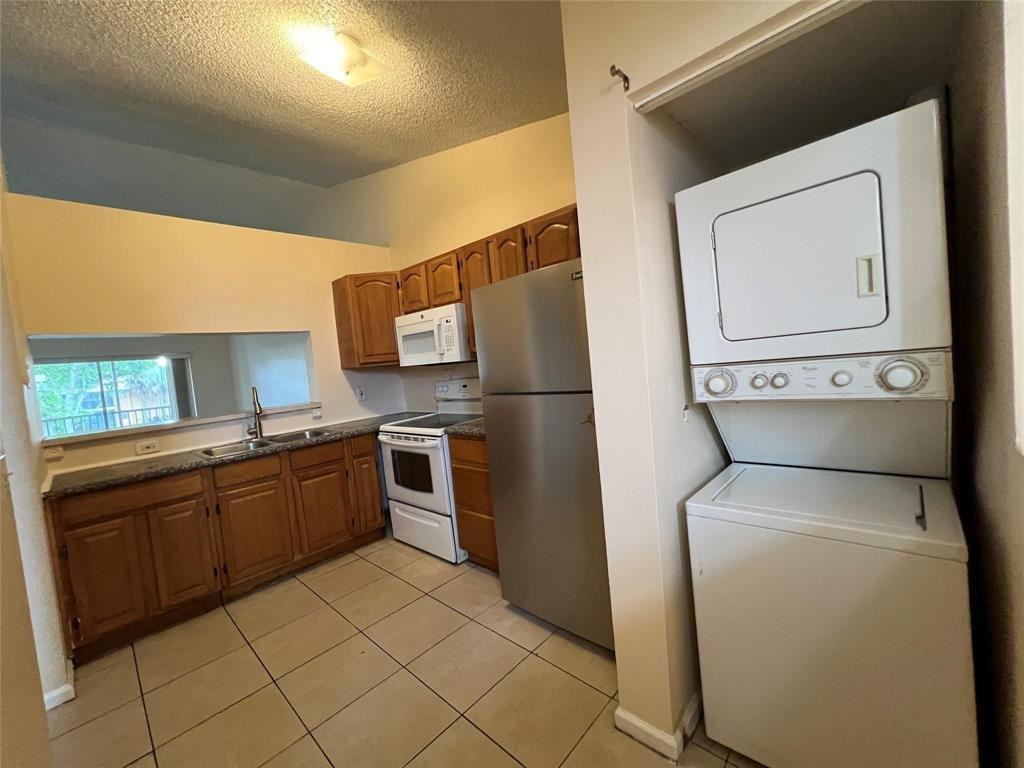 2431 Northwest 56th Avenue #201 - Photo 2 of 6