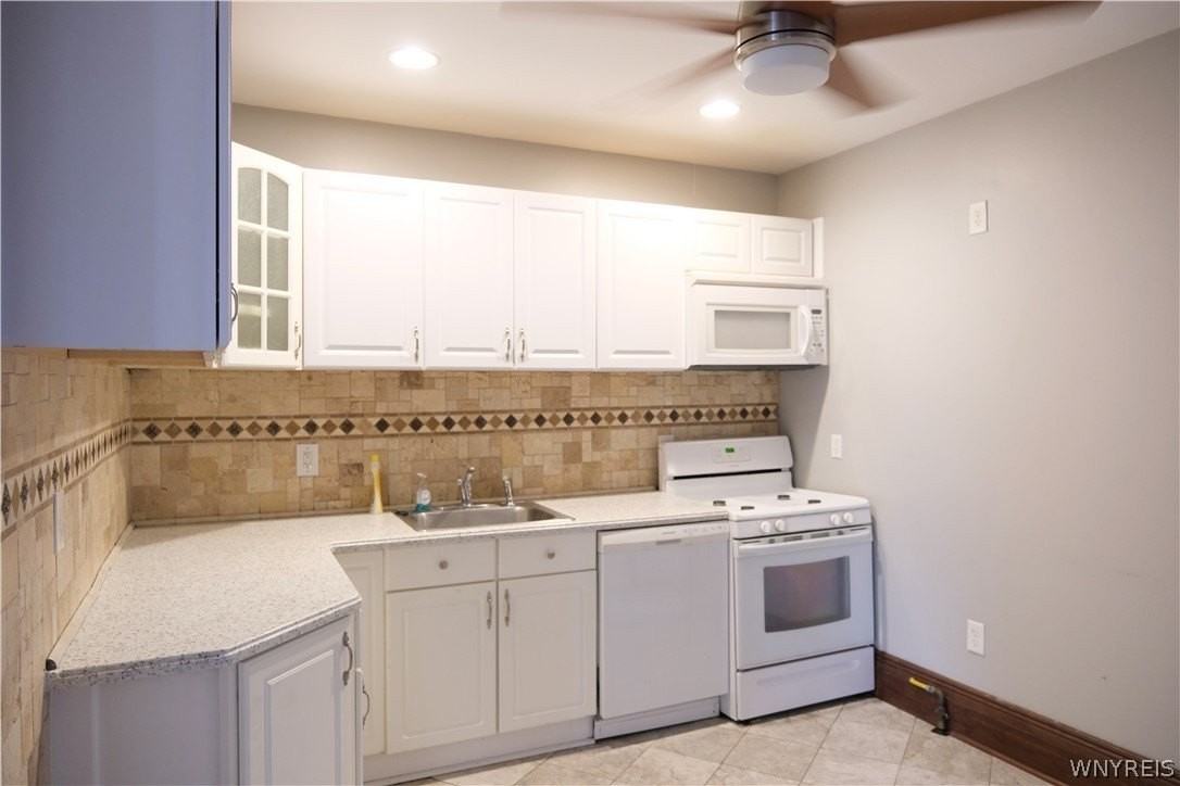 88 W Utica St #1 - Photo 3 of 9