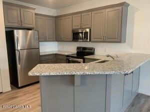 12002 Evanston Ave Unit B #1-2 - Photo 2 of 16
