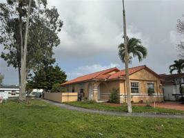 featured image of 7599 W 4th Ct #0