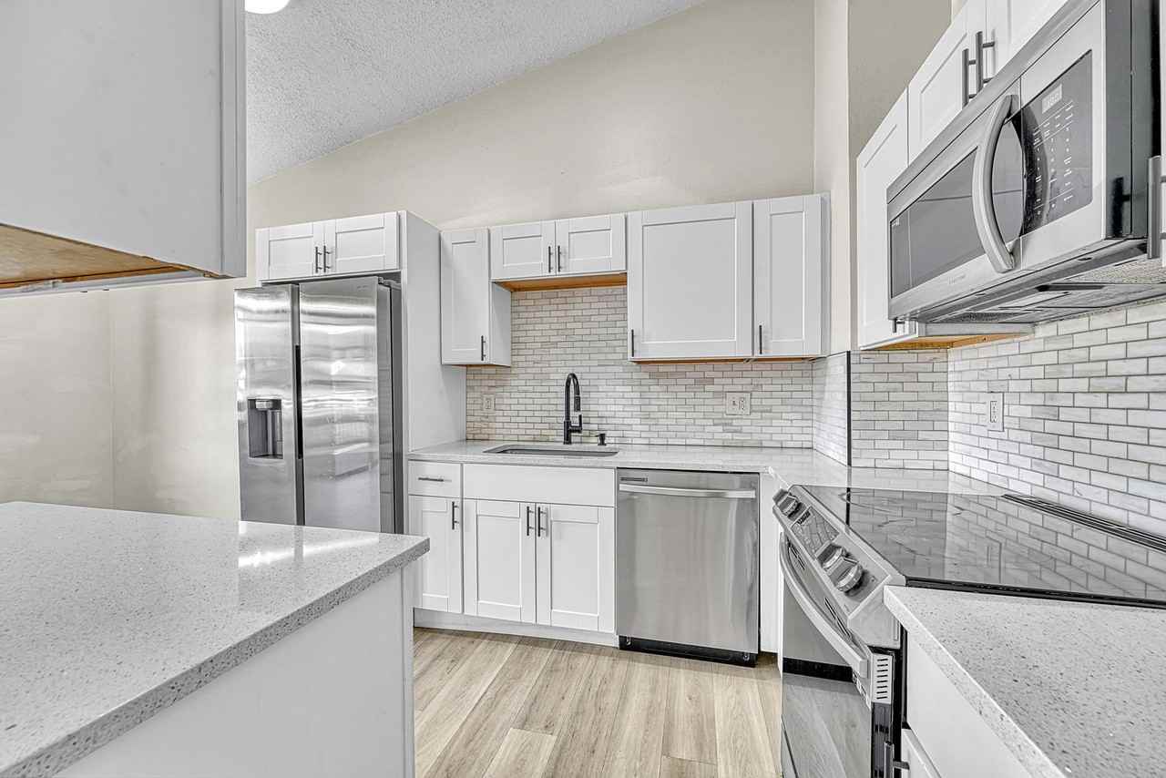 12028 E Harvard Ave - Photo 2 of 29