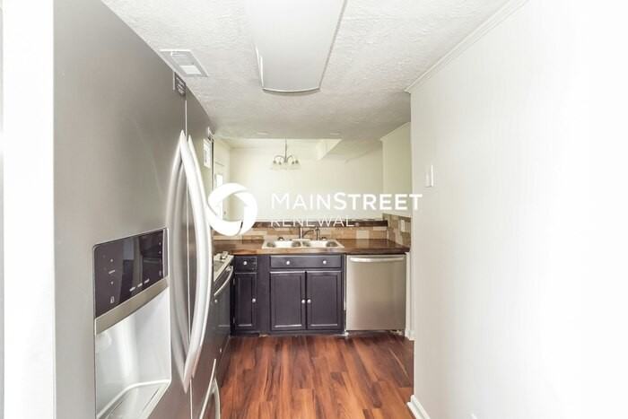 7750 Drawbridge Ct - Photo 7 of 17