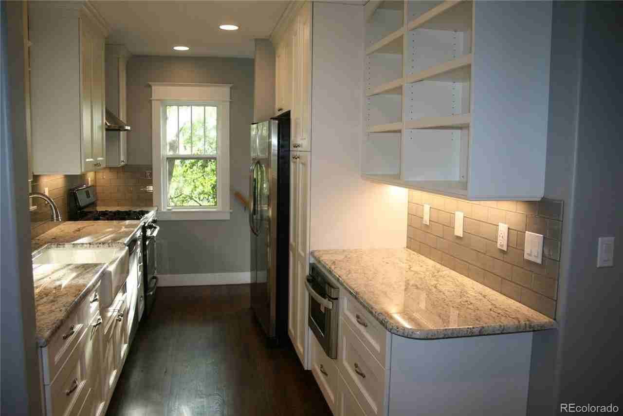 1335 S Ogden St - Photo 5 of 23