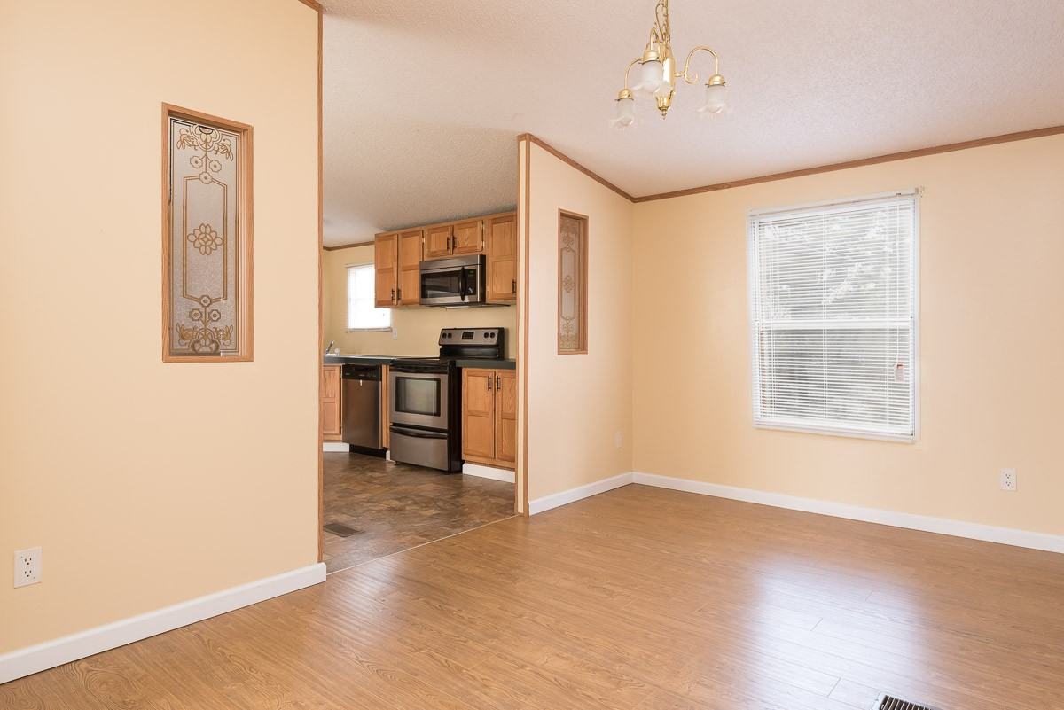 7606 Hunters Ridge Way #1 - Photo 5 of 14