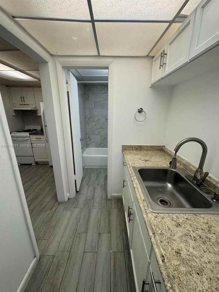 7010 Nw 186th St #5-102A - Photo 2 of 12