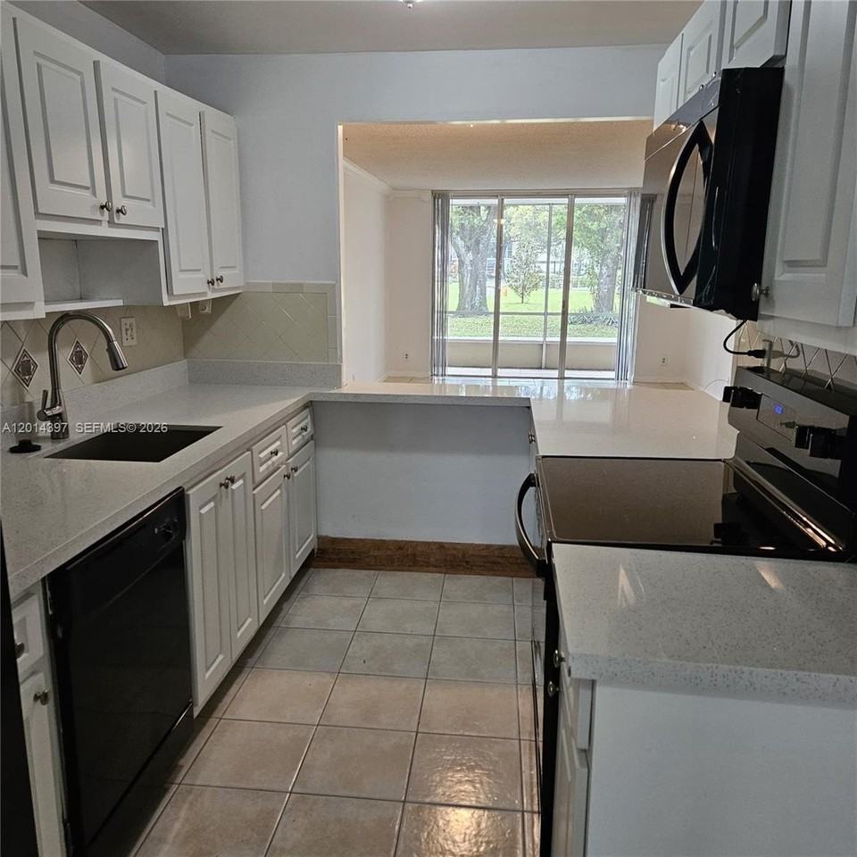 3070 Nw 48th Ter #104 - Photo 2 of 20