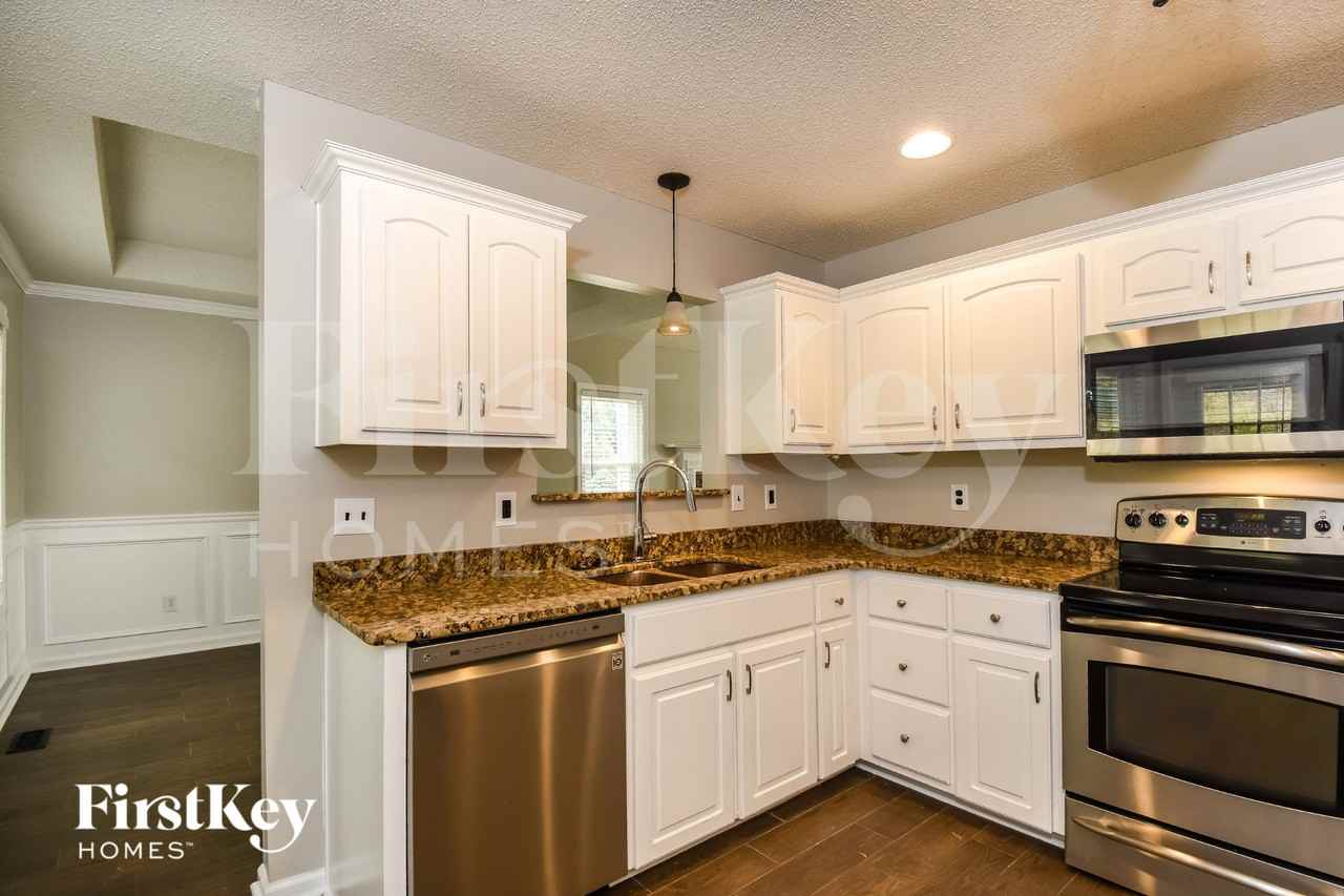 1064 Whispering Woods Dr - Photo 6 of 15