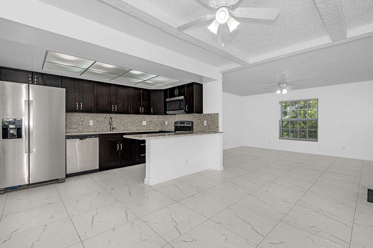 8706 W Sample Rd #4 - Photo 2 of 21