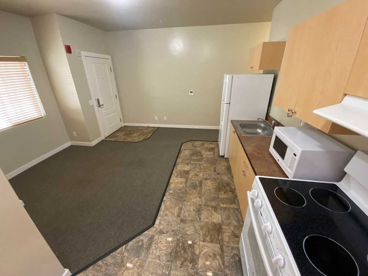 Homefinders - Photo 3 of 18