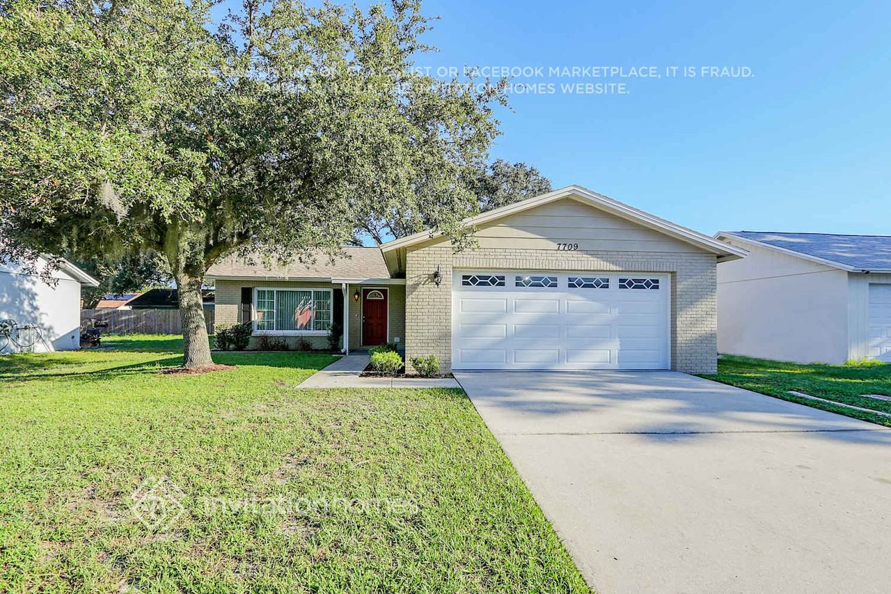 7709 Arlight Dr - Photo 2 of 31