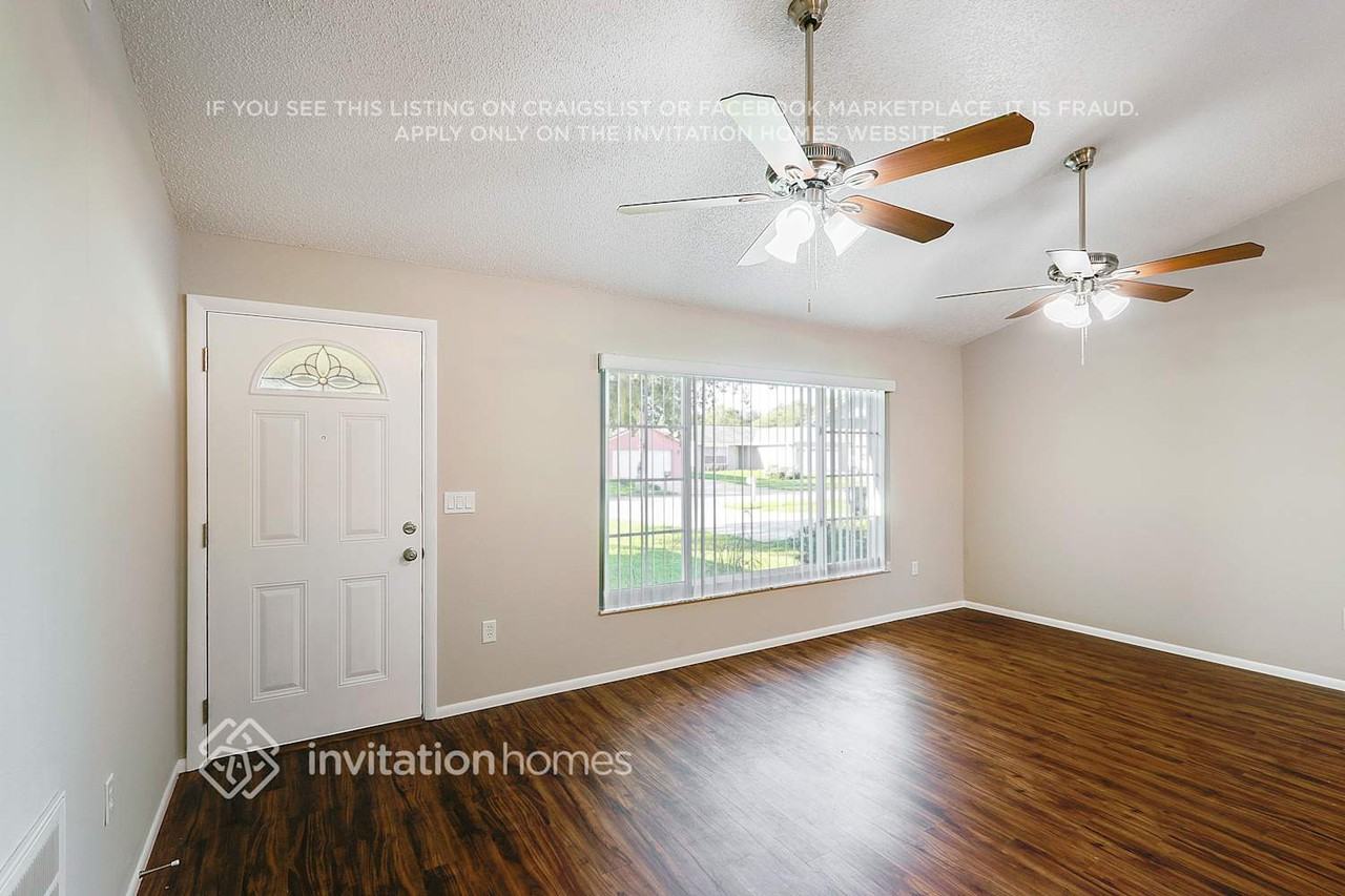 7709 Arlight Dr - Photo 4 of 31