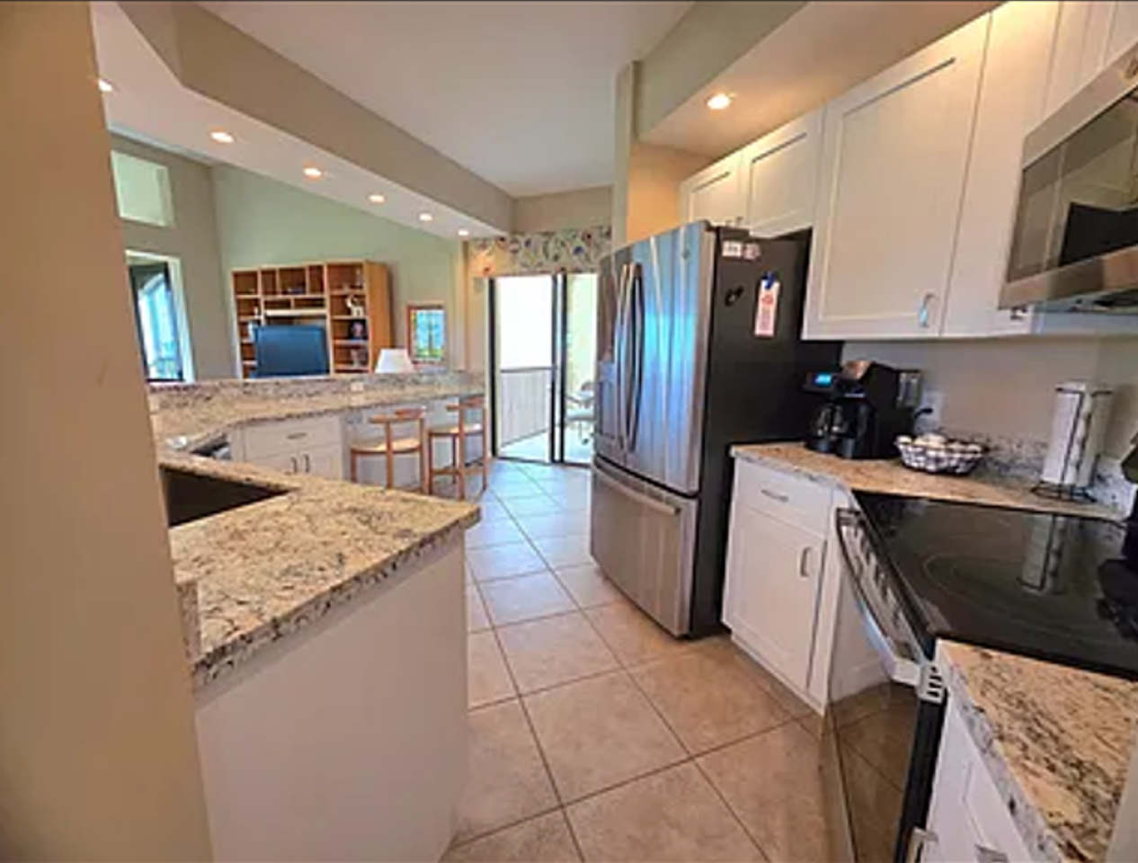 7008 Pelican Bay Blvd - Photo 2 of 14