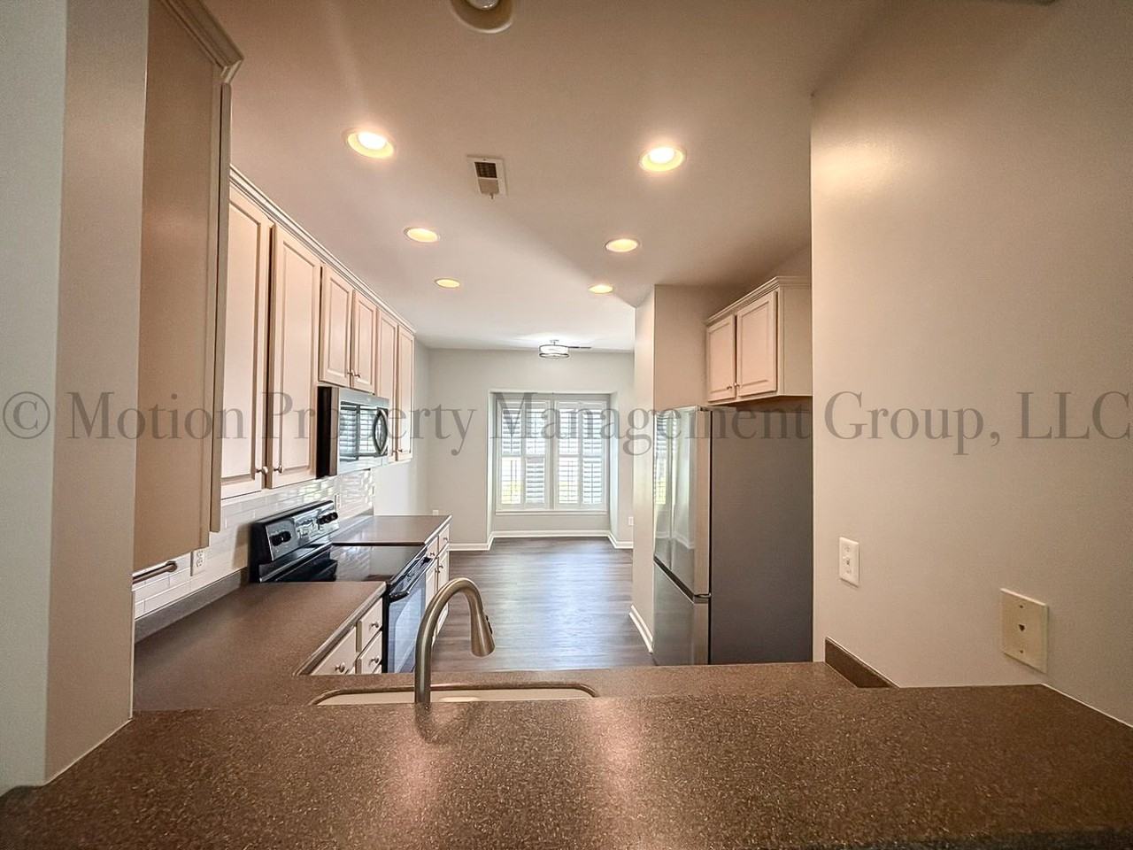 9535 Shumacher Ave Nw - Photo 3 of 17
