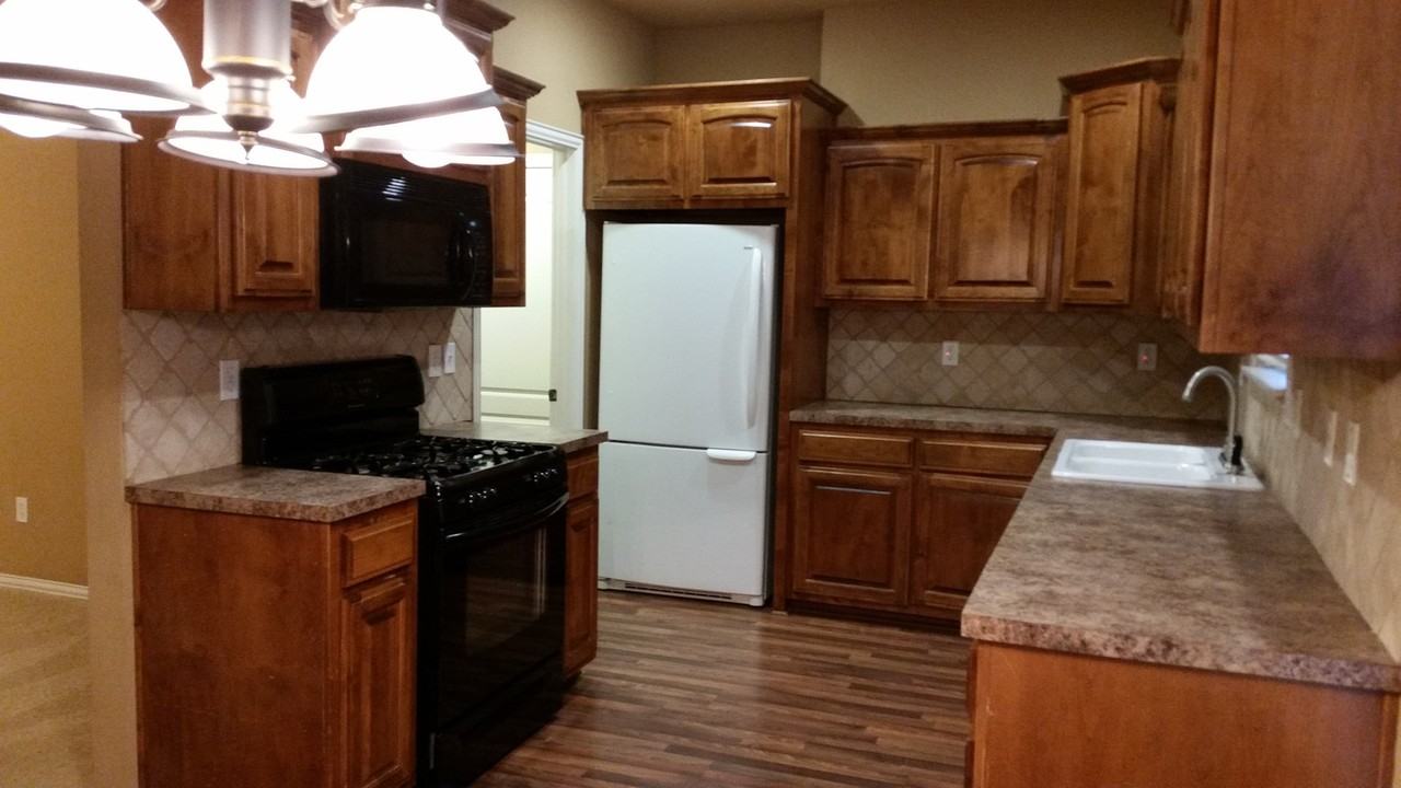 9805 E 108th Ct N - Photo 3 of 12