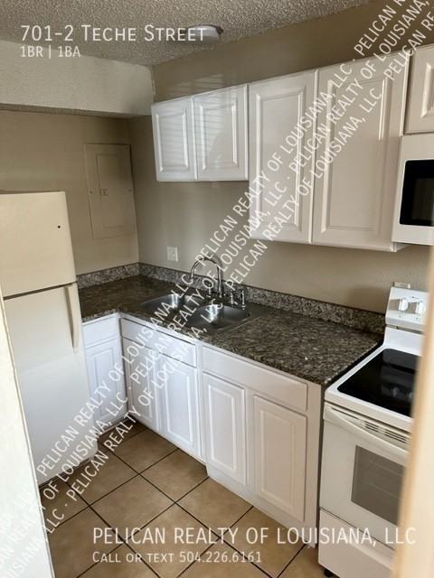 701 Teche St Apt 2 - Photo 6 of 7